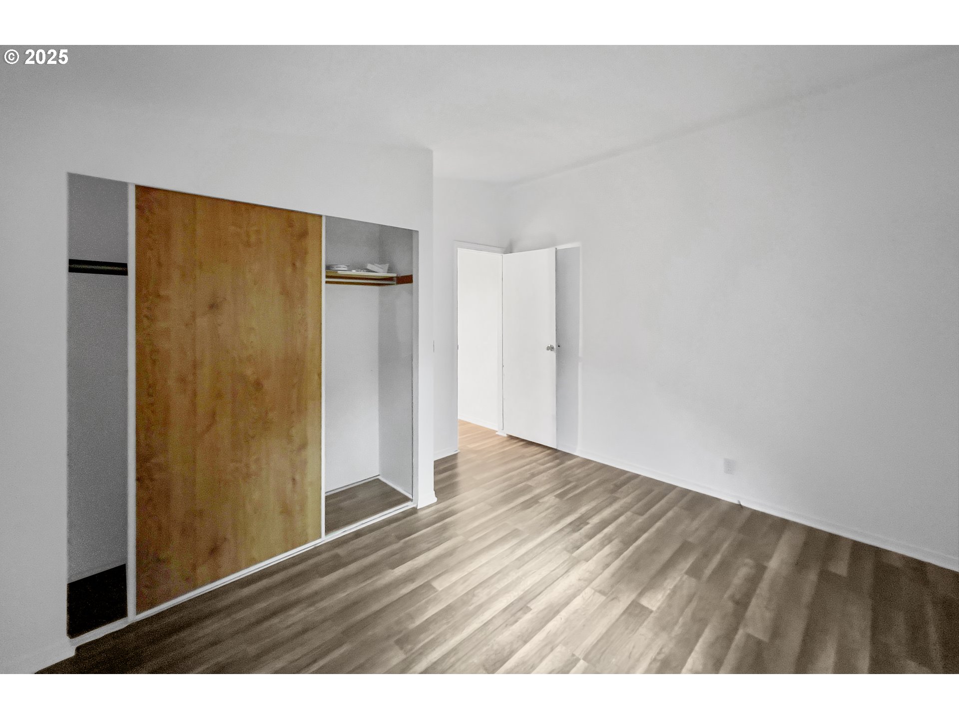 100 Seagrove Loop Lincoln City, OR 97367 - Photo 25 of 36 a view of an empty room with wooden floor