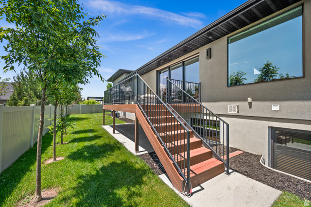 507 West Windmill Gate Cove Draper, UT 84020 - Photo 45 of 46 View of patio / terrace featuring stairway and a sunroom