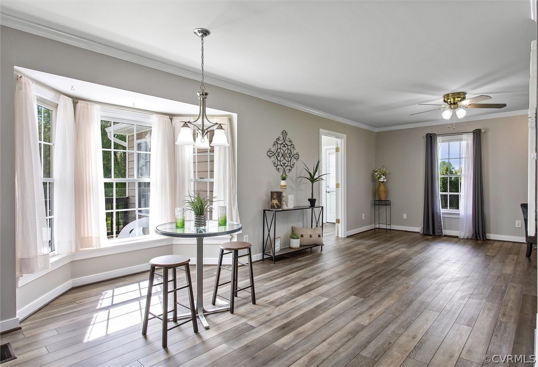 17312 Parsons Ridge Road Beaverdam, VA 23015 - Photo 20 of 49 a view of a dining room with furniture window and wooden floor