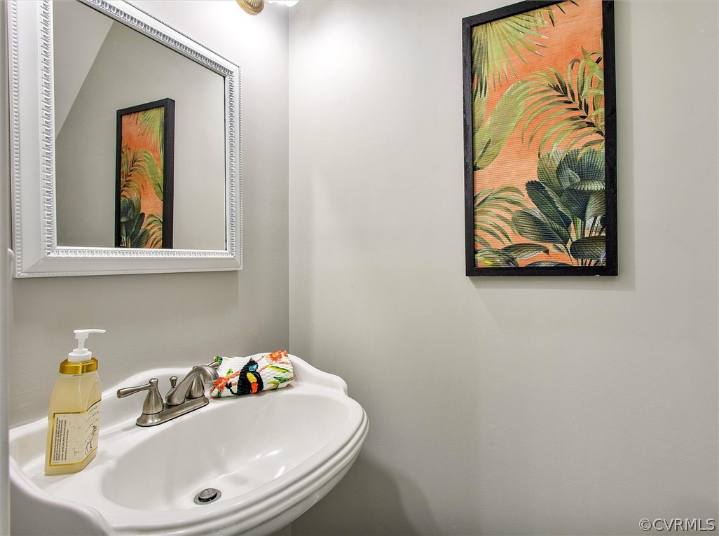 17312 Parsons Ridge Road Beaverdam, VA 23015 - Photo 26 of 49 a bathroom with a sink and a mirror