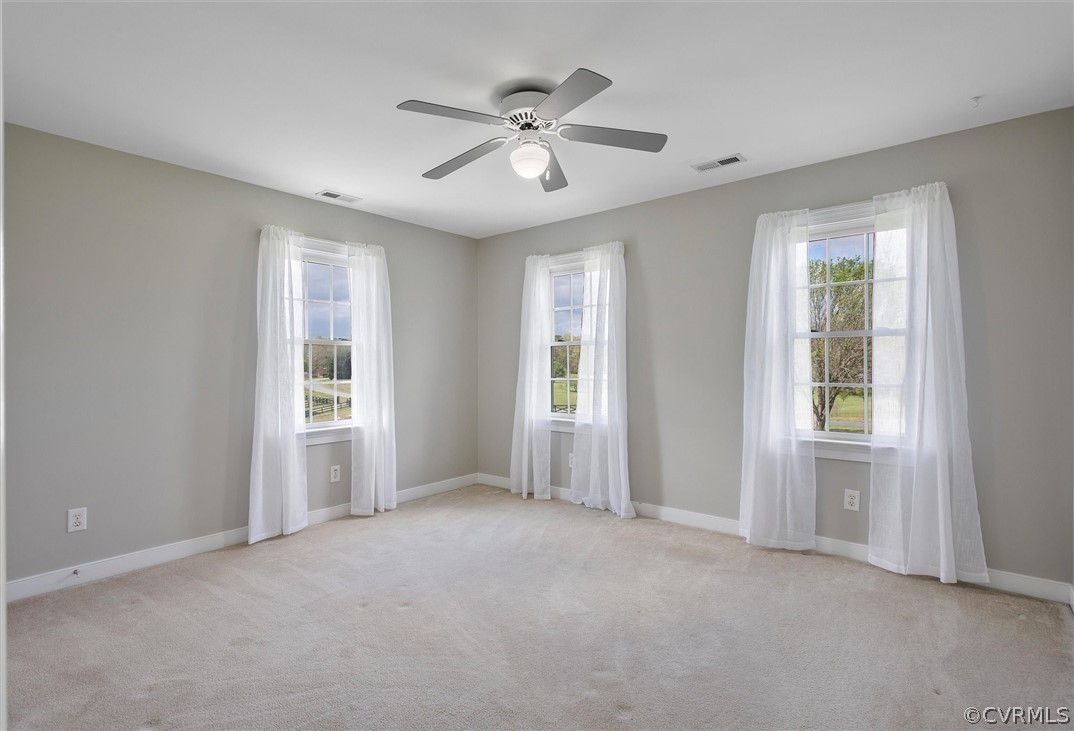 17312 Parsons Ridge Road Beaverdam, VA 23015 - Photo 33 of 49 wooden floor and windows in an empty room