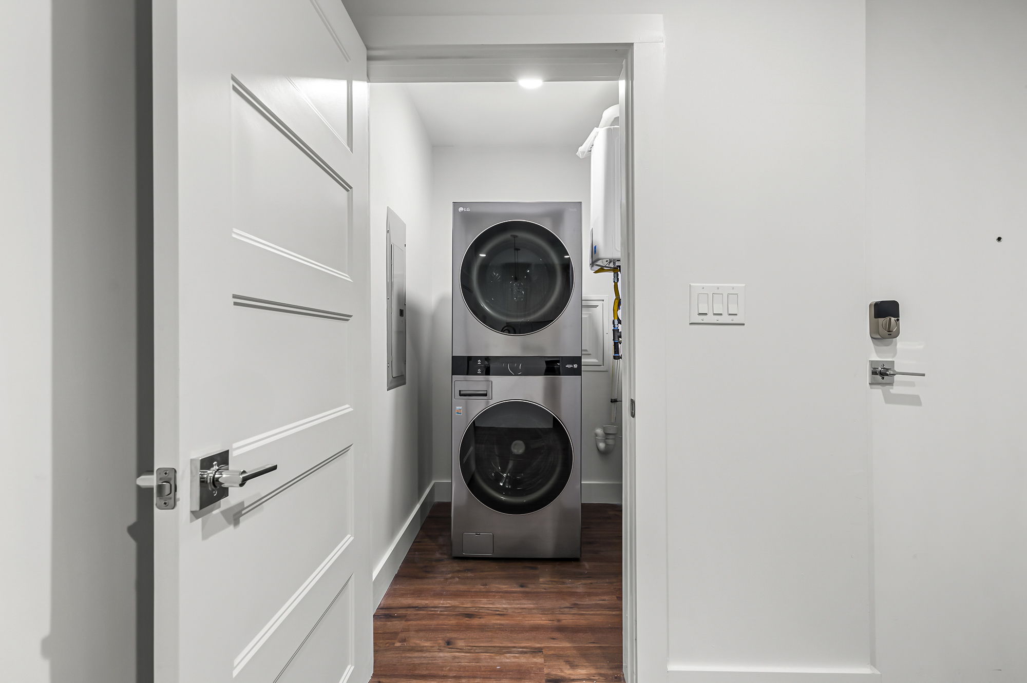 5515 Humming Bird Lane, Unit 309 Austin, TX 78745 - Photo 18 of 38 a view of washer and dryer in a utility room