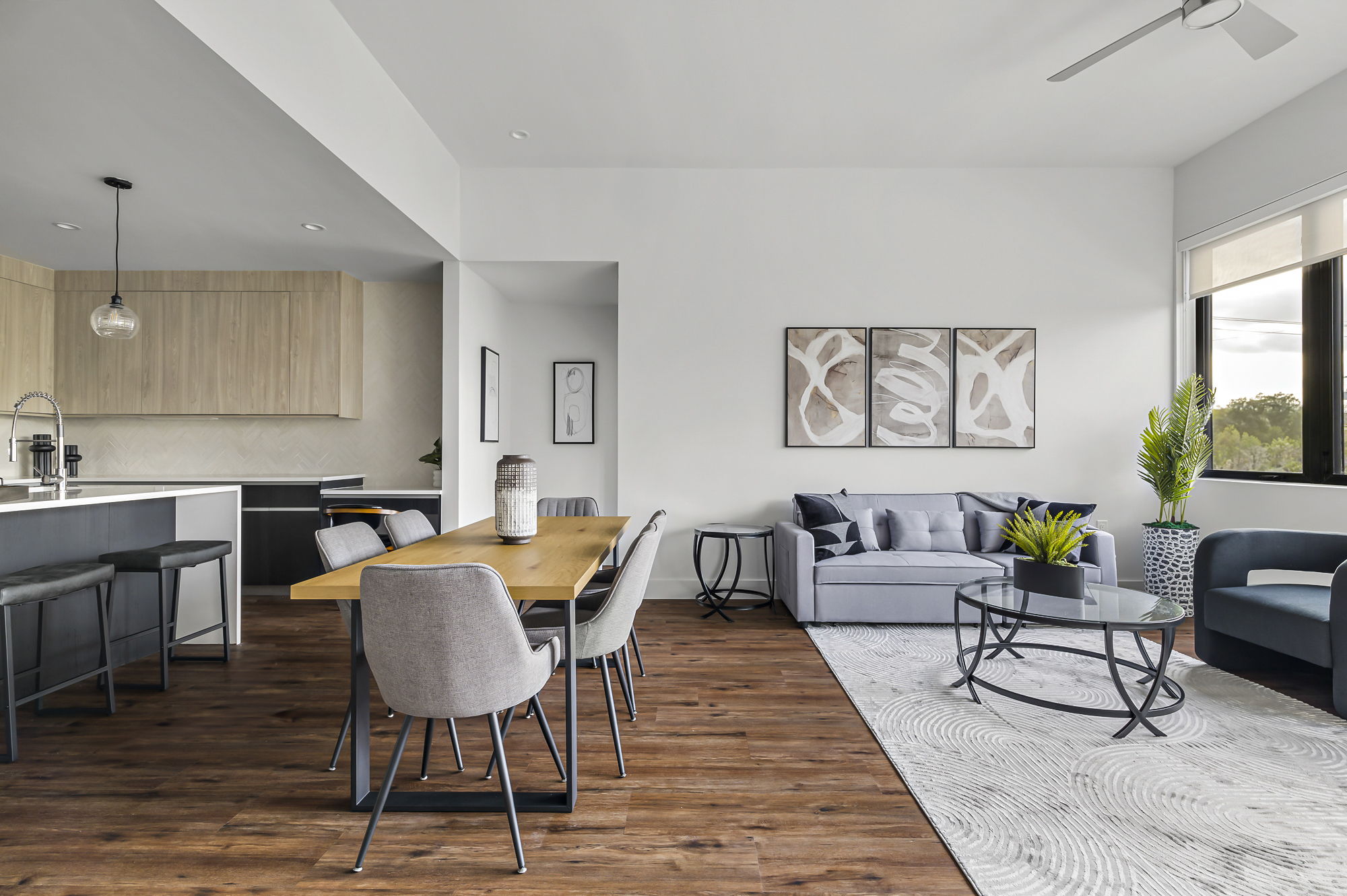 5515 Humming Bird Lane, Unit 309 Austin, TX 78745 - Photo 38 of 38 a living room with furniture and a wooden floor