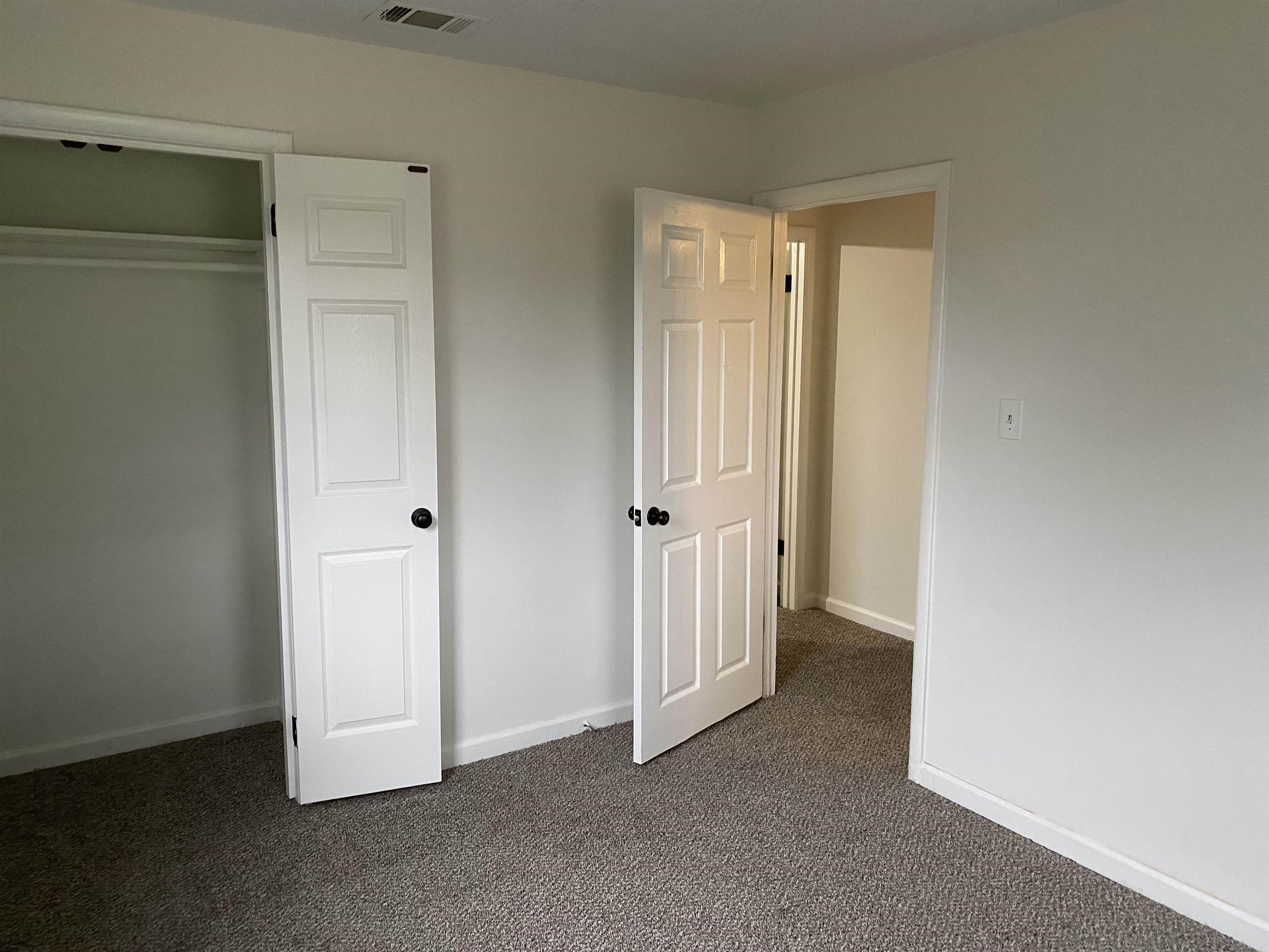 3499 Rochester Road Memphis, TN 38109 - Photo 4 of 13 New carpet and paint with a ceiling fan