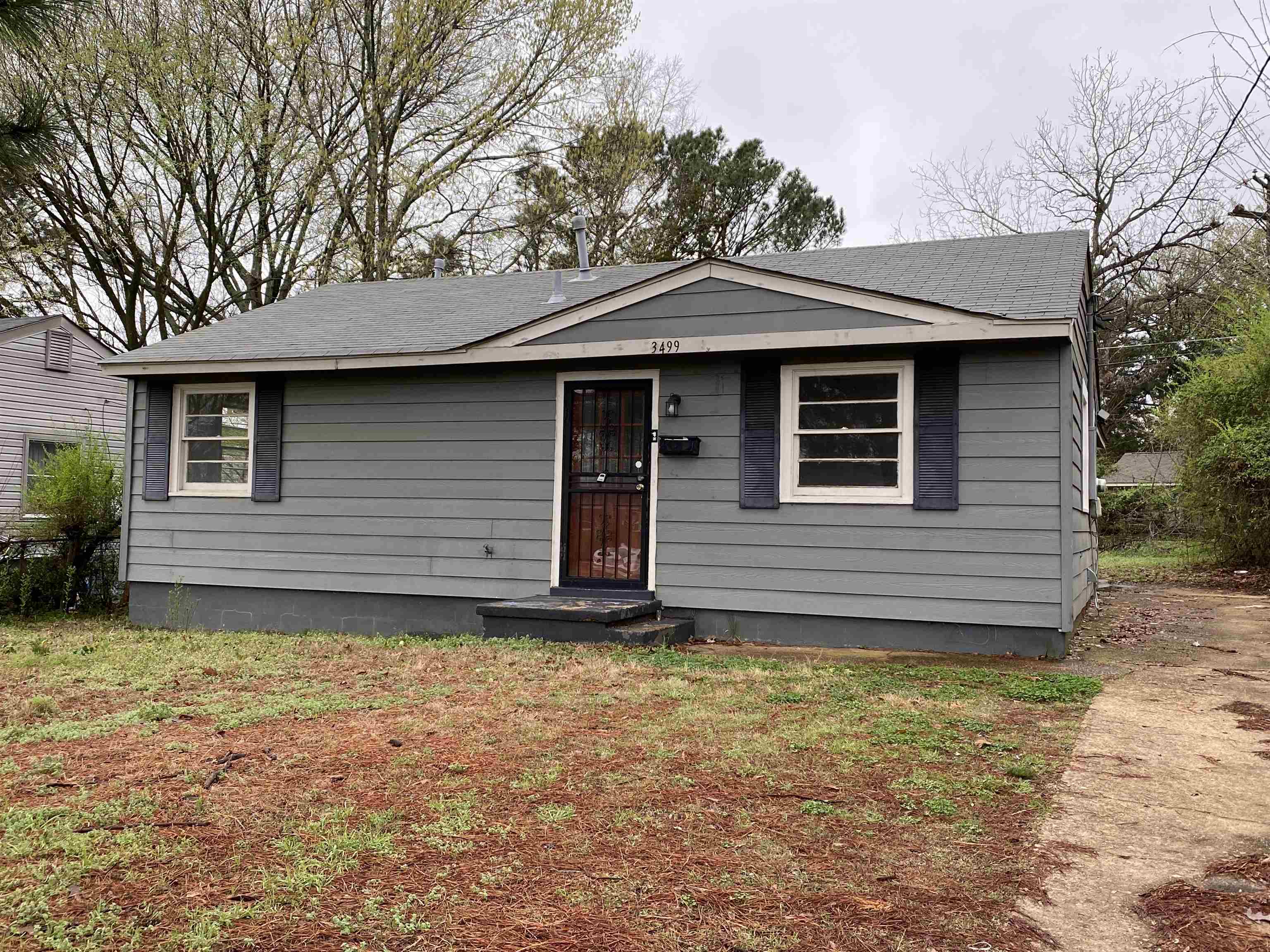 3499 Rochester Road Memphis, TN 38109 - Photo 6 of 13 View of front facade with a shingled roof