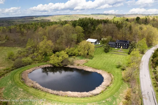 a front view of a house with garage