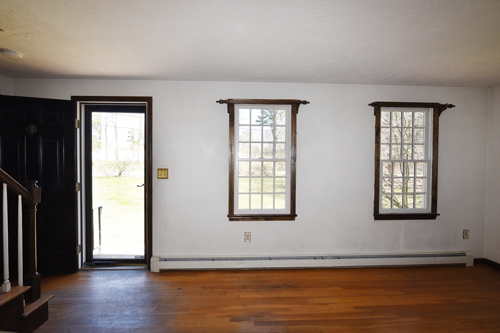 15 Furnace Street Marshfield, MA 02050 - Photo 20 of 41 an empty room with wooden floor and windows