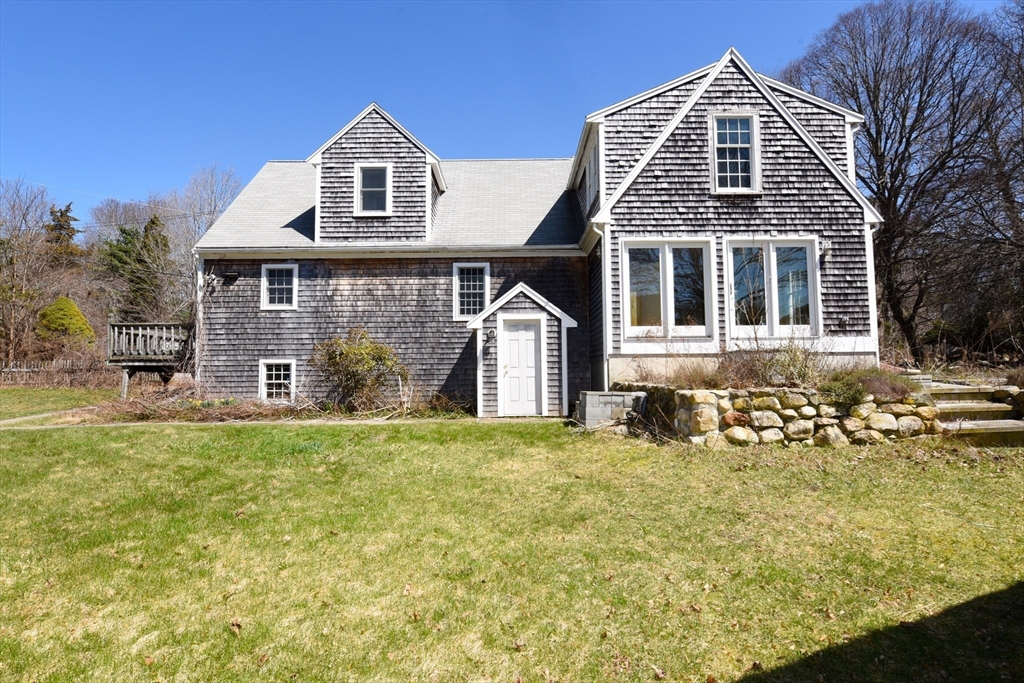 15 Furnace Street Marshfield, MA 02050 - Photo 2 of 41 a front view of a house with a yard