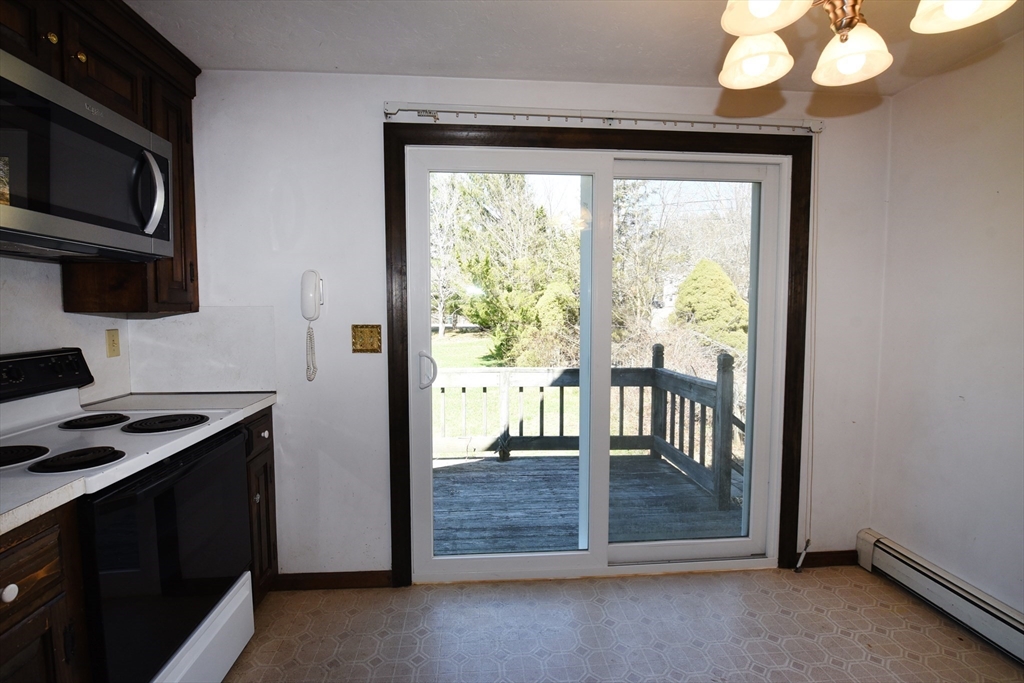 15 Furnace Street Marshfield, MA 02050 - Photo 26 of 41 a view of a kitchen from a hallway