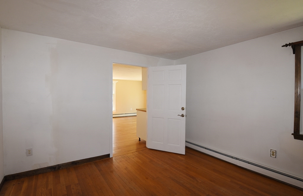 15 Furnace Street Marshfield, MA 02050 - Photo 29 of 41 a view of an empty room and wooden floor and closet