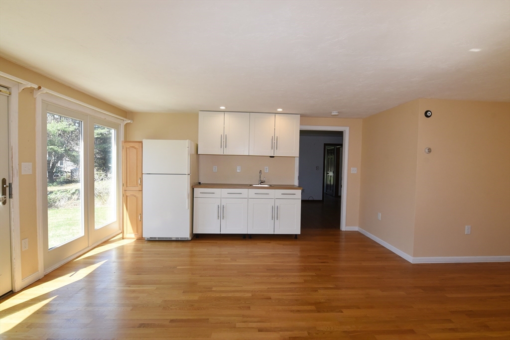 15 Furnace Street Marshfield, MA 02050 - Photo 36 of 41 a kitchen with a refrigerator and window