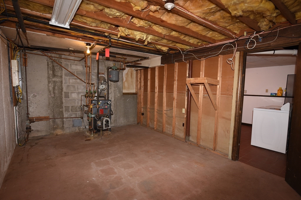 15 Furnace Street Marshfield, MA 02050 - Photo 39 of 41 a view of a storage room with chairs