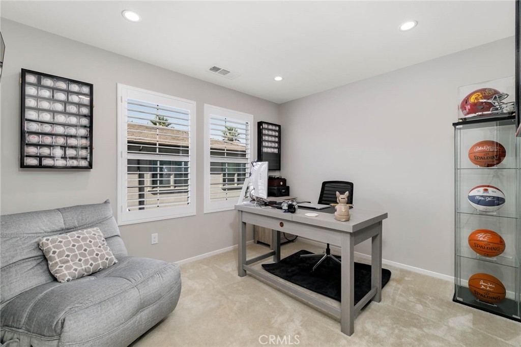 837 Iris Way, Unit C Azusa, CA 91702 - Photo 12 of 38 a living room with furniture and a window