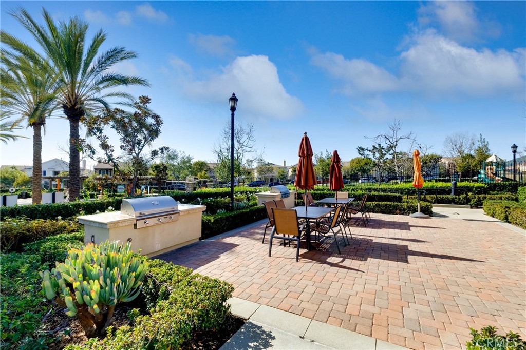 837 Iris Way, Unit C Azusa, CA 91702 - Photo 22 of 38 a view of a patio with chairs and a table