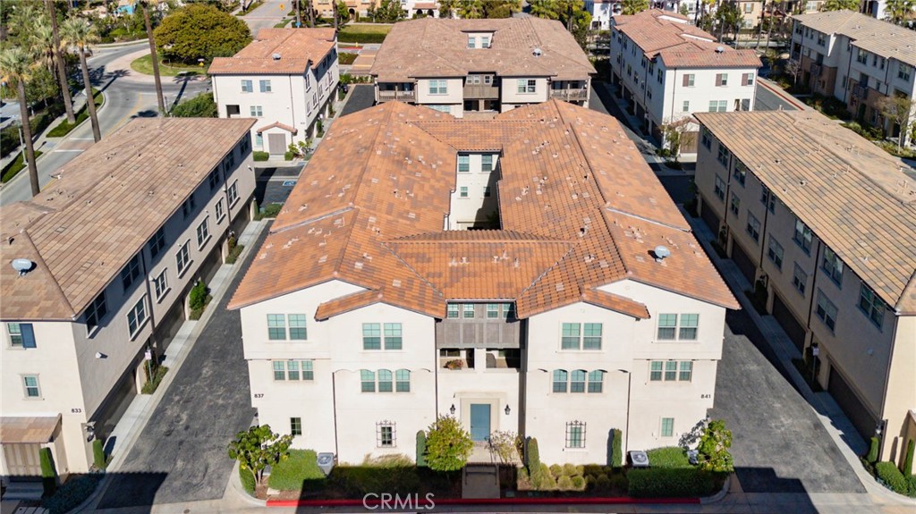 837 Iris Way, Unit C Azusa, CA 91702 - Photo 30 of 38 an aerial view of a multi story residential apartment building