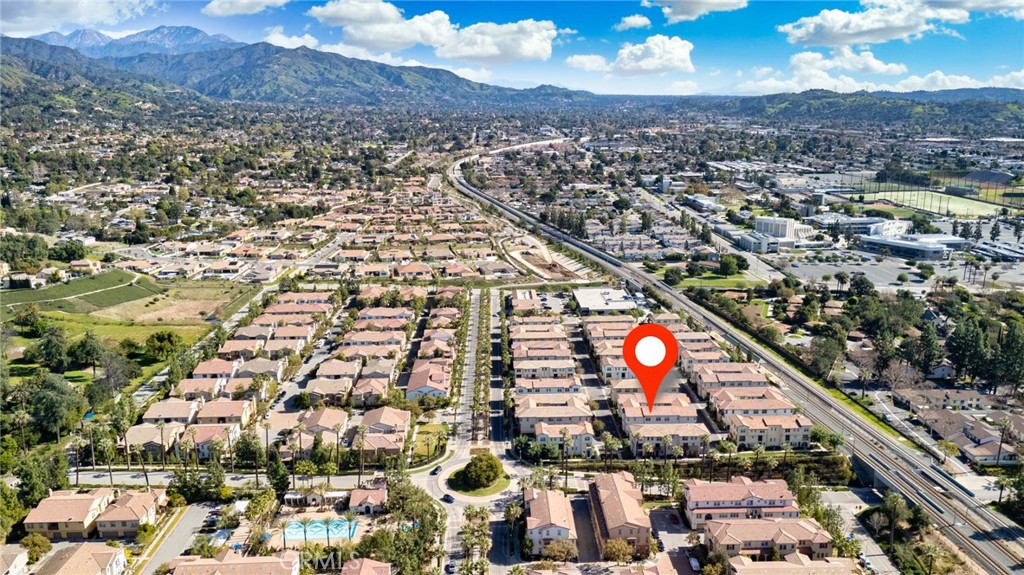 837 Iris Way, Unit C Azusa, CA 91702 - Photo 37 of 38 an aerial view of residential houses with outdoor space