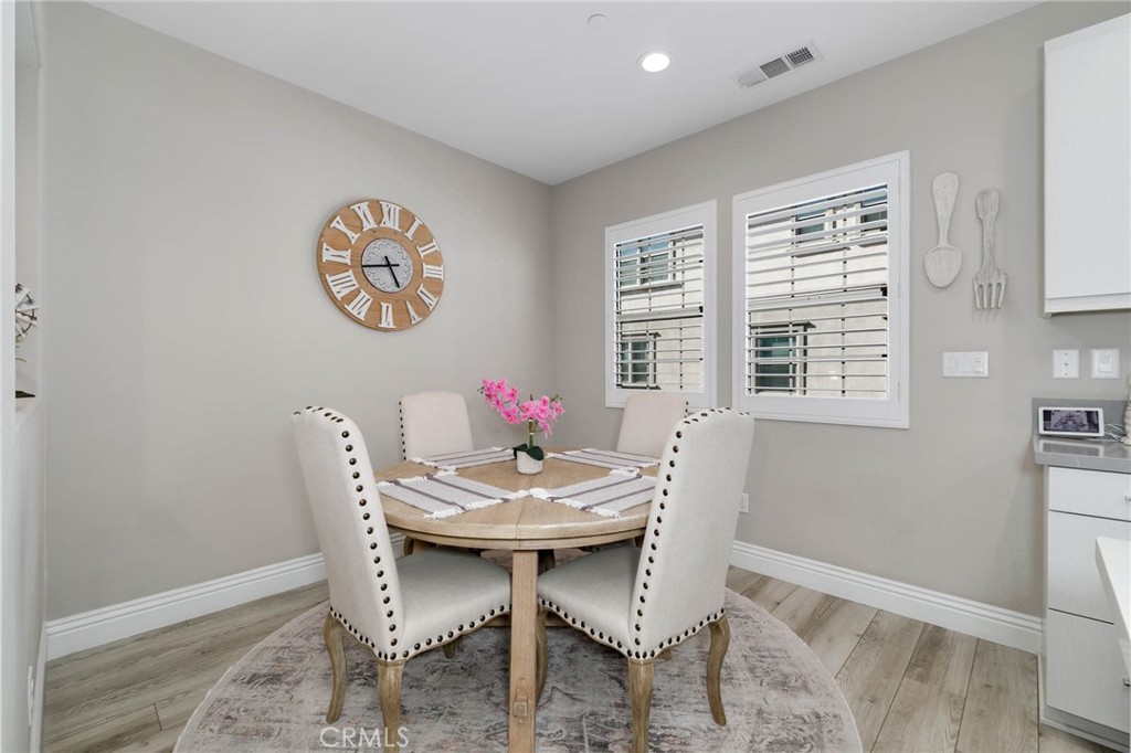 837 Iris Way, Unit C Azusa, CA 91702 - Photo 6 of 38 a dining room with furniture and window