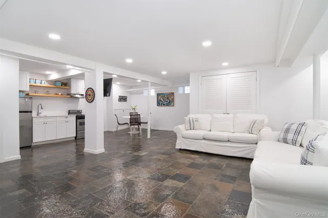 a view of a livingroom with furniture and a couch