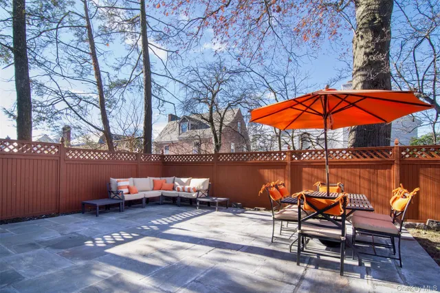 a view of swimming pool with an outdoor space and sitting area