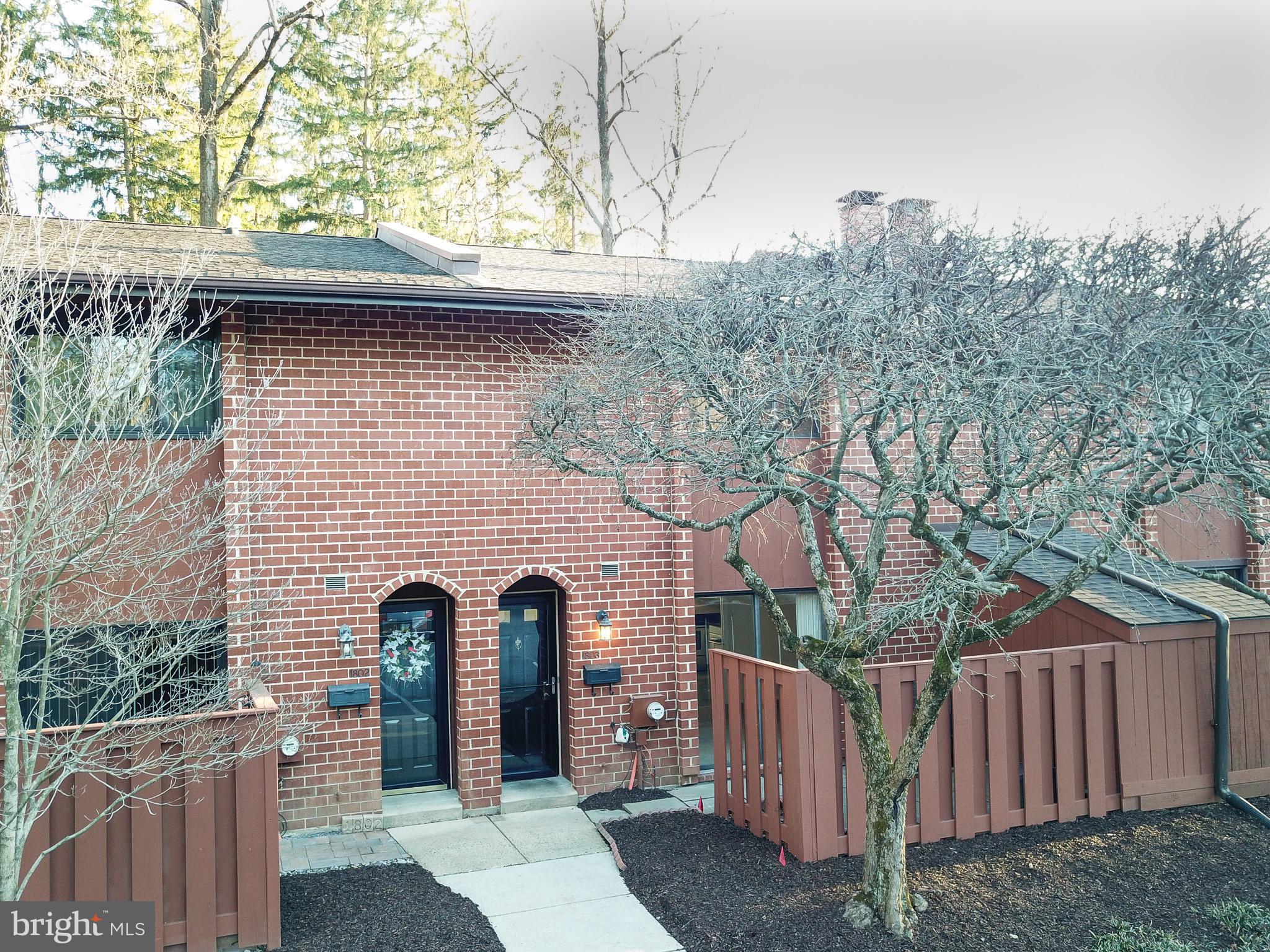 1803 Worthington Drive Exton, PA 19341 - Photo 1 of 27 a front view of a house with garden