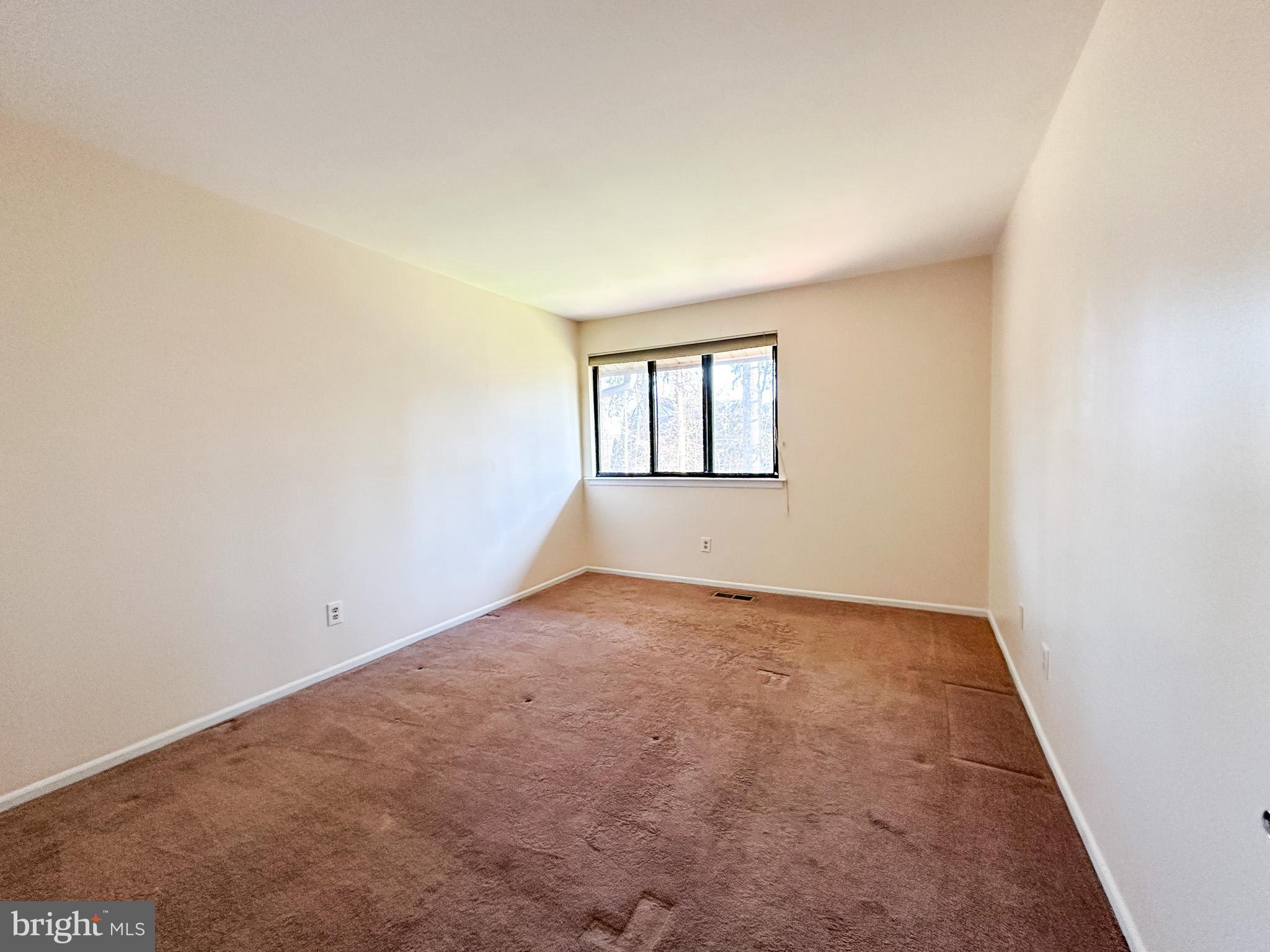 1803 Worthington Drive Exton, PA 19341 - Photo 22 of 27 an empty room with windows
