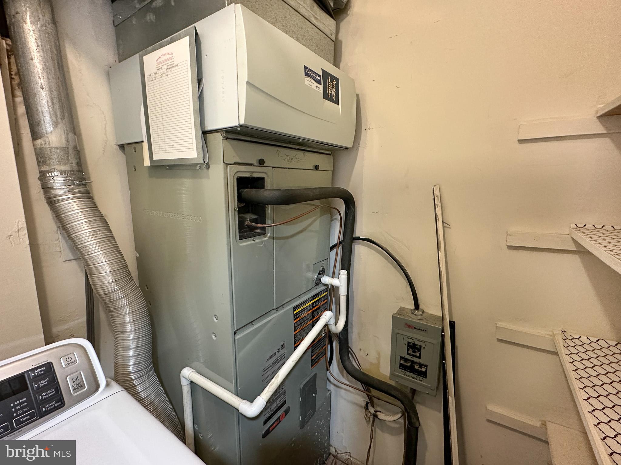 1803 Worthington Drive Exton, PA 19341 - Photo 24 of 27 a utility room with dryer and washer