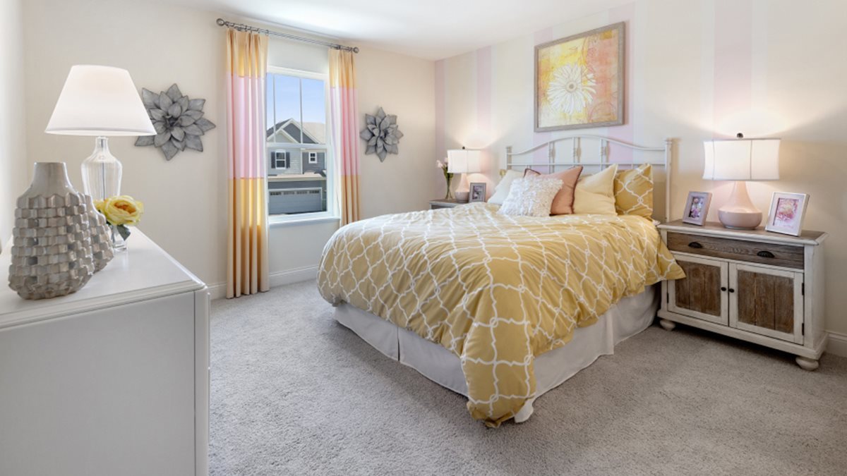 16151 Lake View Road Plainfield, IL 60586 - Photo 12 of 21 a spacious bedroom with a bed and a table