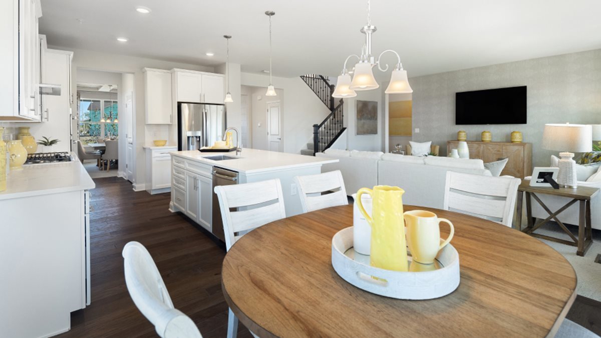 16151 Lake View Road Plainfield, IL 60586 - Photo 5 of 21 a living room with furniture a fireplace and a flat screen tv