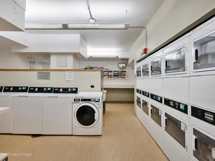a view of kitchen with washer and dryer