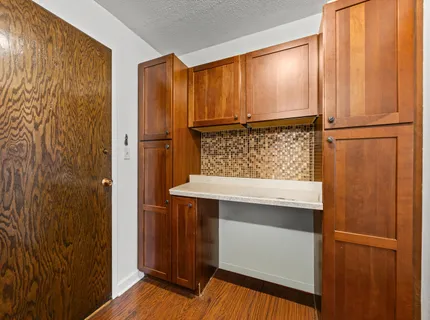 a bathroom with a shower and a sink