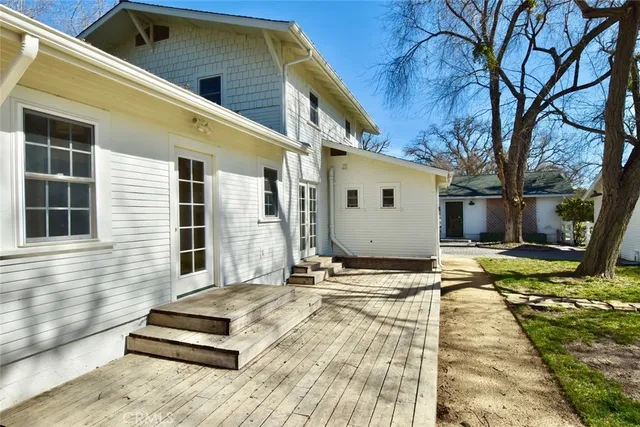 a view of a patio with a yard