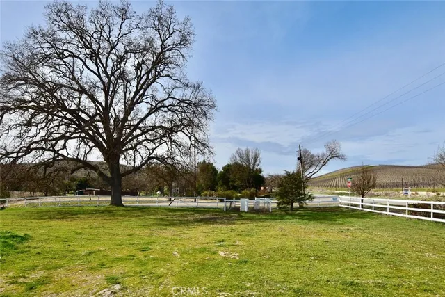 a view of a swimming pool with an outdoor space and seating area
