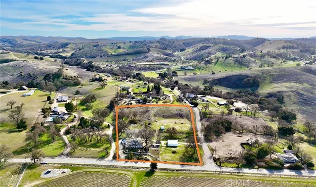 a bath tub sitting next to a shower curtain