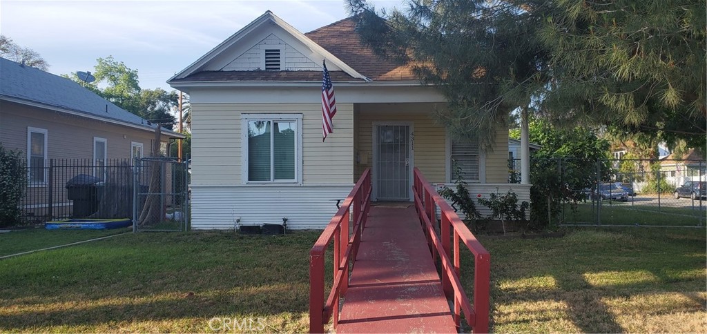 4311 University Avenue Riverside, CA 92501 - Photo 1 of 1 a front view of a house with a yard
