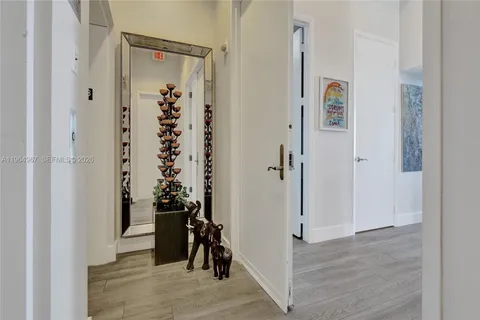 a view of furniture with wooden floor