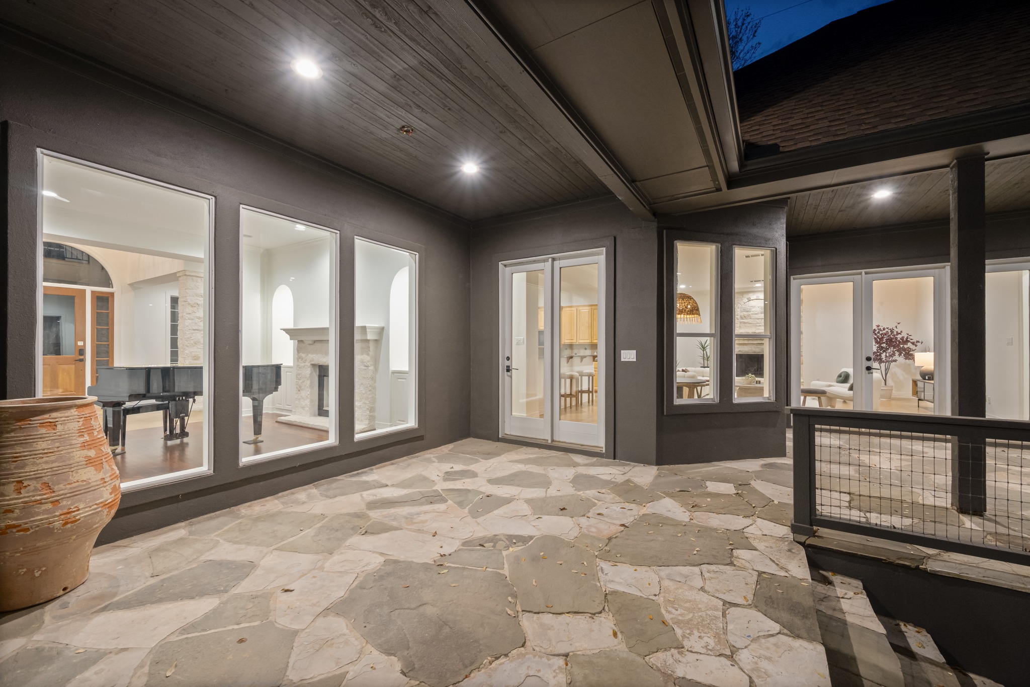 600 River Hills Road Austin, TX 78733 - Photo 11 of 40 Beautiful stone raised patio accessible from main living, primary and kitchen