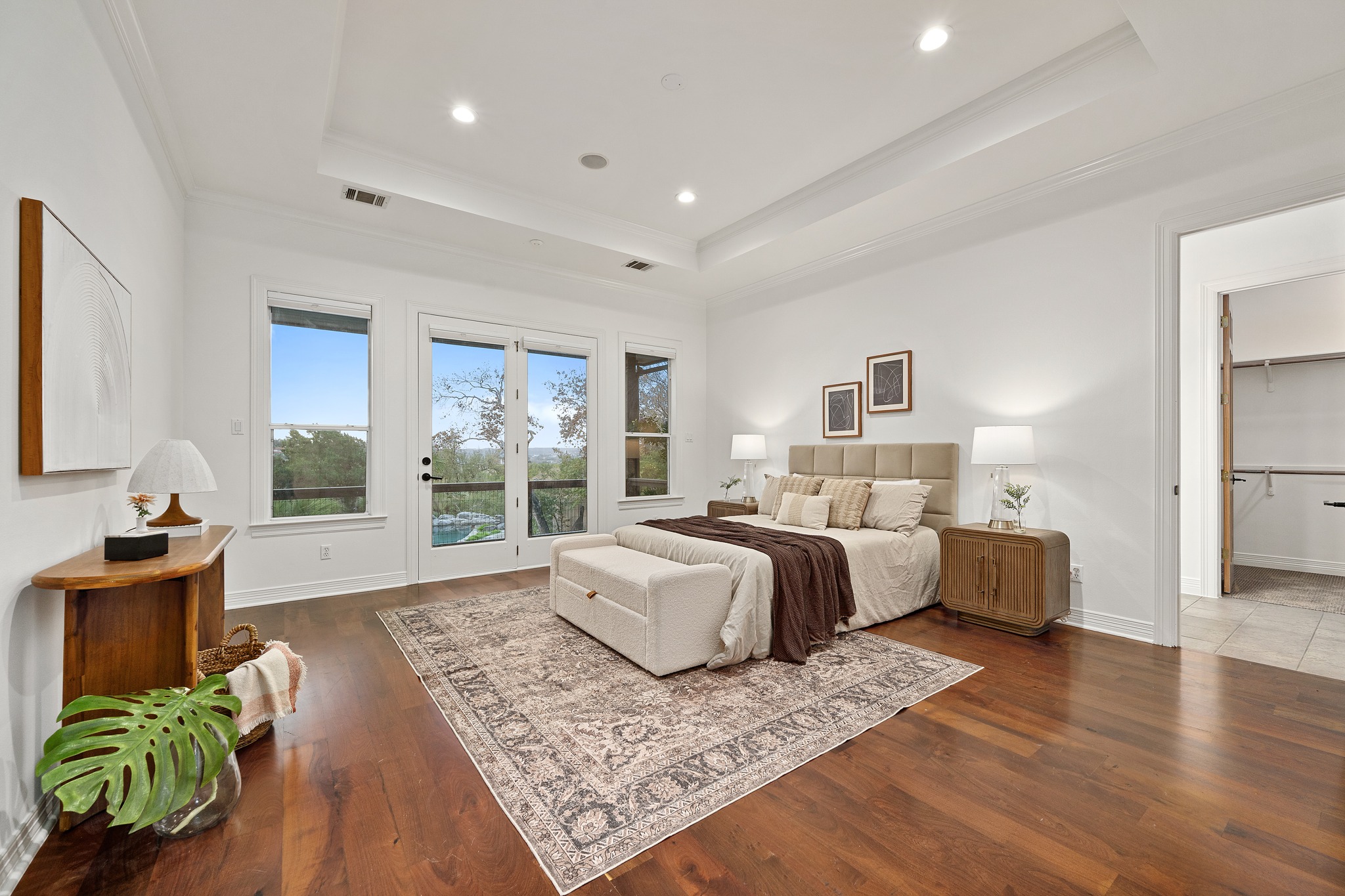 600 River Hills Road Austin, TX 78733 - Photo 19 of 40 Sizable primary main level bedroom on private wing with access to deck