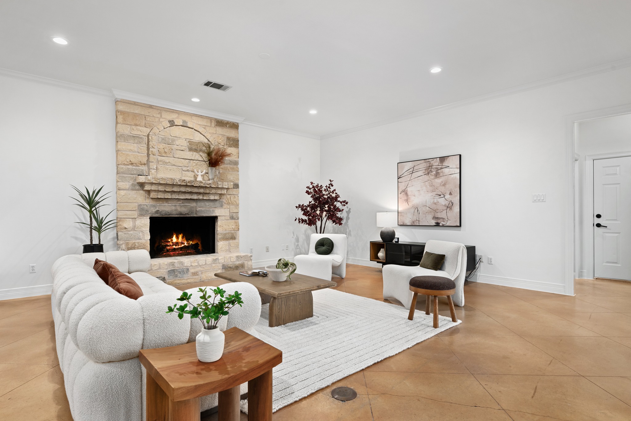 600 River Hills Road Austin, TX 78733 - Photo 10 of 40 Family room anchored by stone fireplace