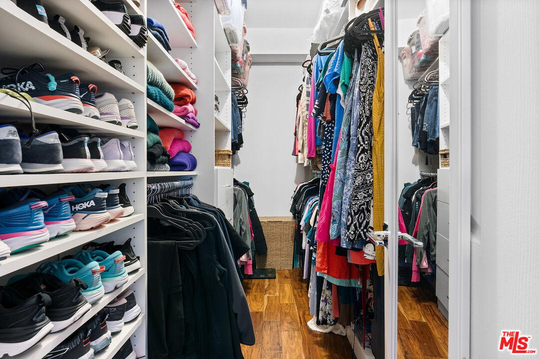8160 Manitoba Street, Unit 101 Playa del Rey, CA 90293 - Photo 13 of 20 a view of walk in closet with clothes and shoes