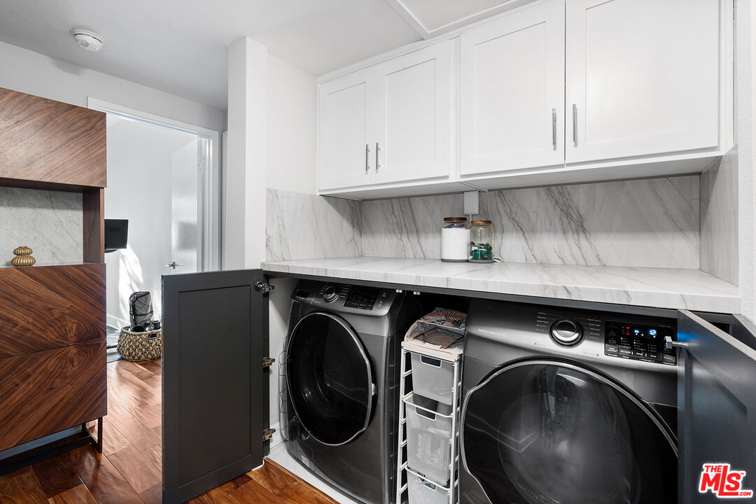 8160 Manitoba Street, Unit 101 Playa del Rey, CA 90293 - Photo 10 of 20 a utility room with dryer and washer