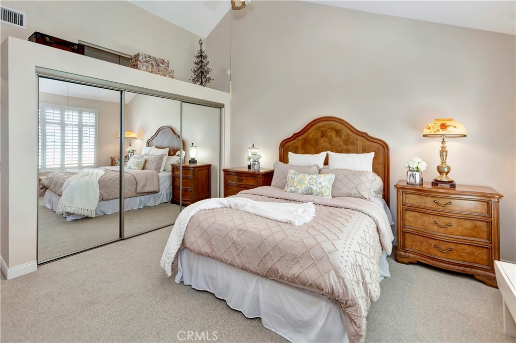 2523 Back Bay Loop, Unit 45 Costa Mesa, CA 92627 - Photo 14 of 26 High-vaulted ceiling and mirrored wardrobe create abundant light and space