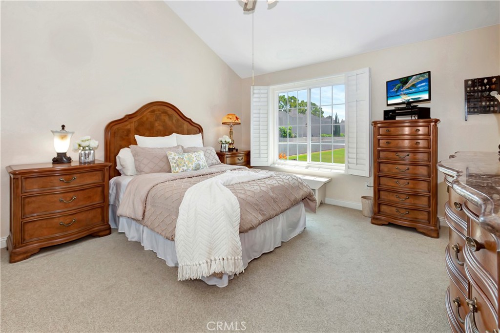 2523 Back Bay Loop, Unit 45 Costa Mesa, CA 92627 - Photo 15 of 26 Master Bedroom with vaulted ceiling, plantation shutters, ceiling fan and expansive views to Upper Back Bay and beyond.