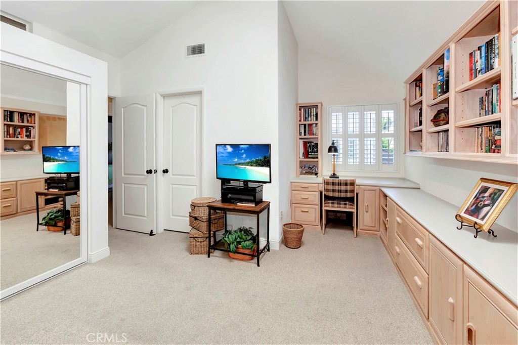 2523 Back Bay Loop, Unit 45 Costa Mesa, CA 92627 - Photo 19 of 26 Another view of Third Bedroom showing wraparound desk. This can easily be converted back into a spacious secondary Master if desired.