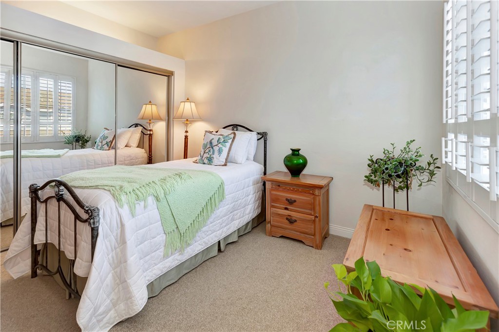 2523 Back Bay Loop, Unit 45 Costa Mesa, CA 92627 - Photo 21 of 26 Light-filled secondary bedroom with plantation shutters