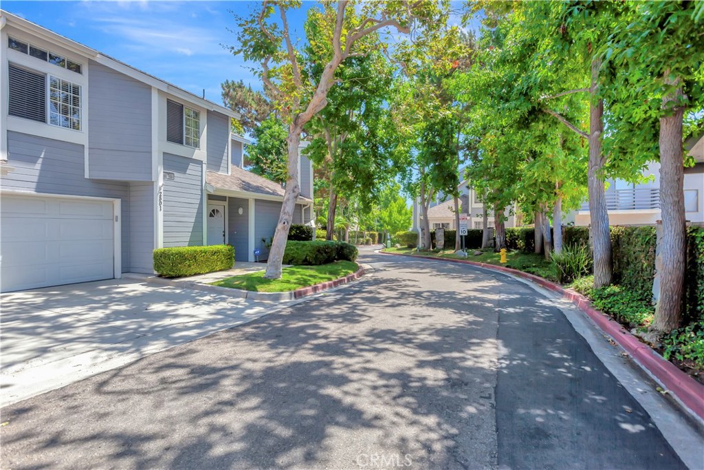 2523 Back Bay Loop, Unit 45 Costa Mesa, CA 92627 - Photo 4 of 26 Follow tree-lined private road as it winds through community.