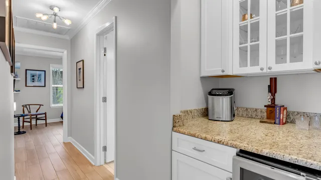 a kitchen with cabinets and sink