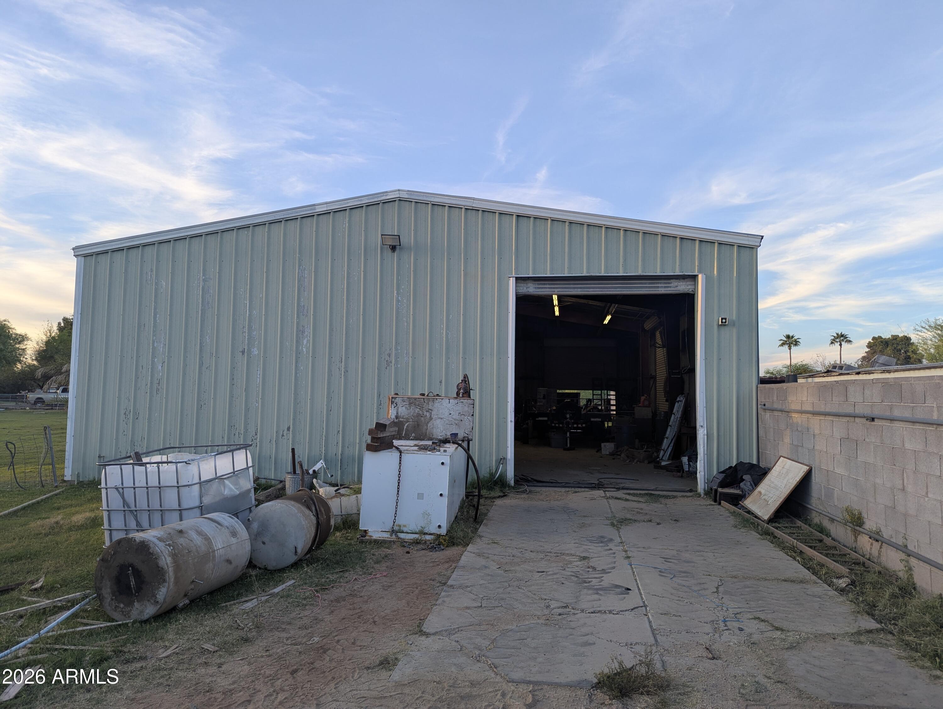 6508 West Fremont Road Laveen, AZ 85339 - Photo 23 of 32 a backyard of a house with seating space