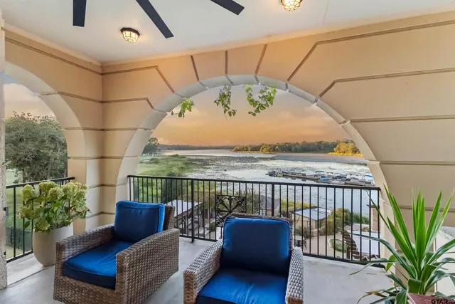 a living room with furniture fireplace and a flat screen tv