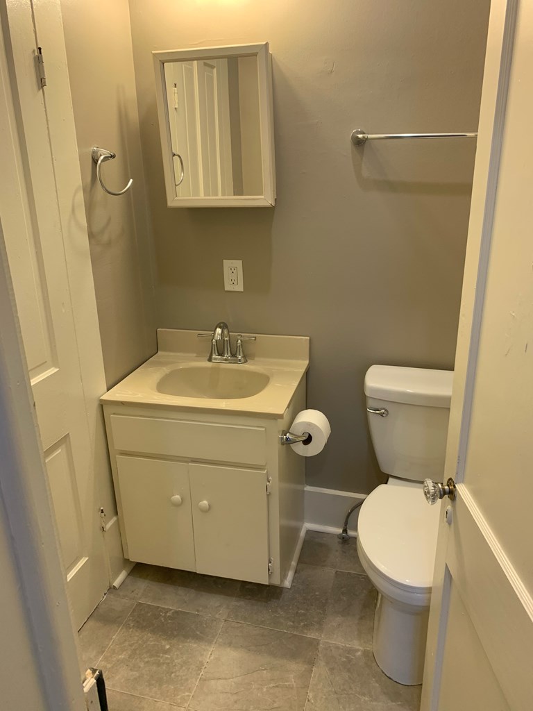 1360 Rhodes Street, Unit B Columbus, GA 31901 - Photo 10 of 14 a bathroom with a sink and a toilet