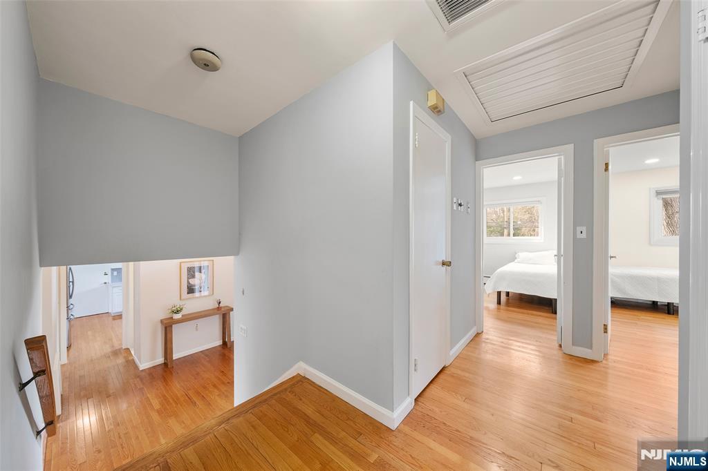 970 Soldier Hill Road Emerson, NJ 07630 - Photo 15 of 37 a view of a livingroom with wooden floor and furniture